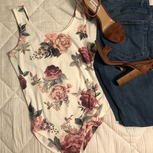 Floral Body Suit . Only worn once.